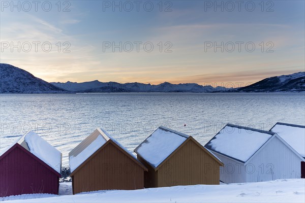 Colored wooden huts on the Nordfjord