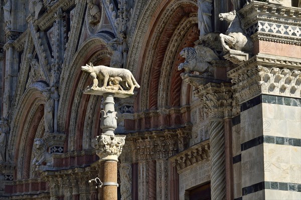 She-wolf with Romulus and Remus in front of the Duomo of Siena