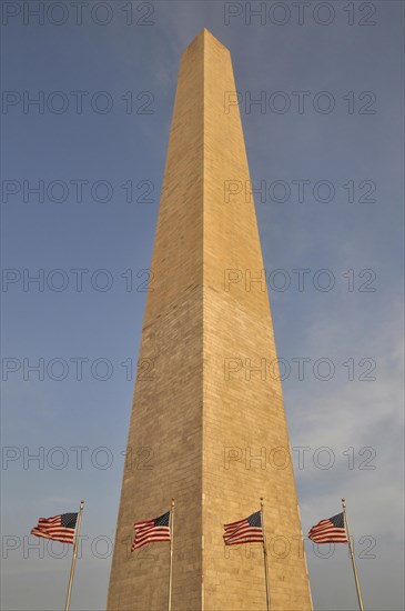Washington Monument and flags of the United States