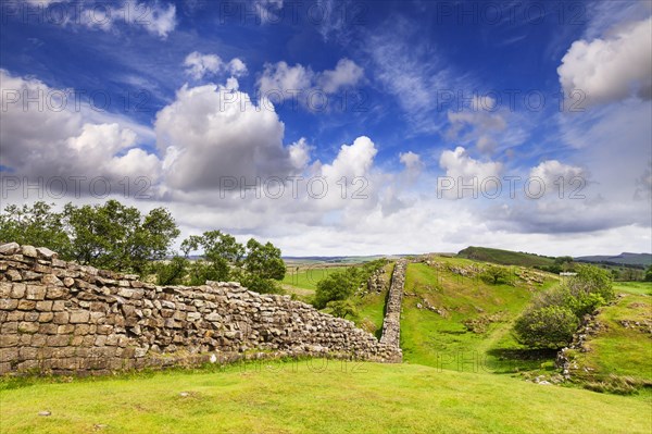 Hadrian's Wall under a dramatic sky at Walltown Crags