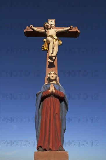 Colored stone crucifix with Mary