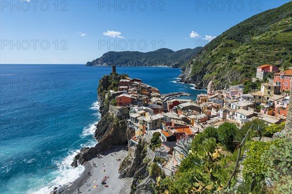 Colorful houses on cliffs with beach