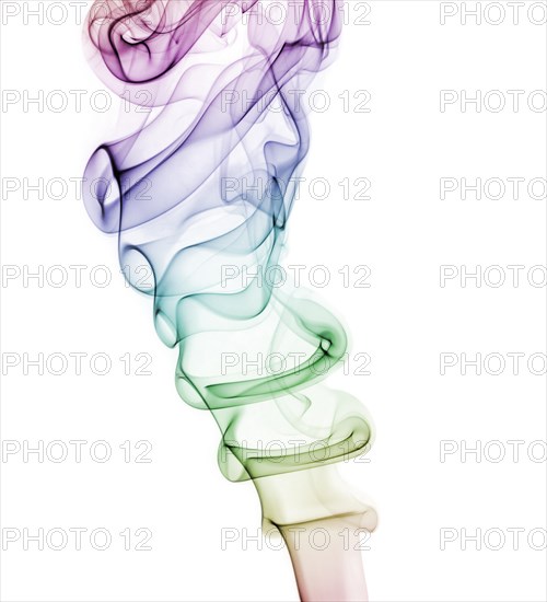 Colourful smoke from an incense stick or joss stick