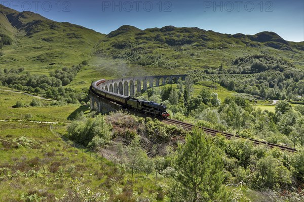 Glenfinnan viaduct from the Harry Potter films with historic train