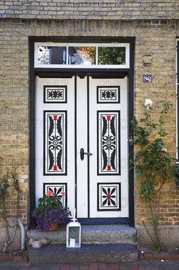 Historical house with decorative wooden door