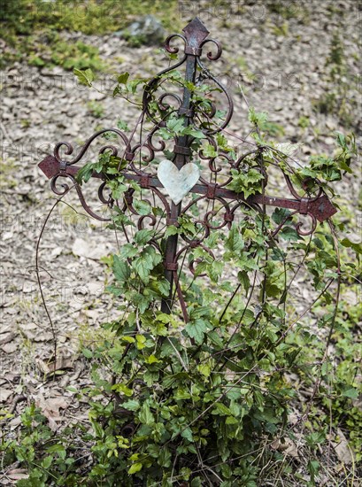 Iron Cross with heart grave in a cemetery