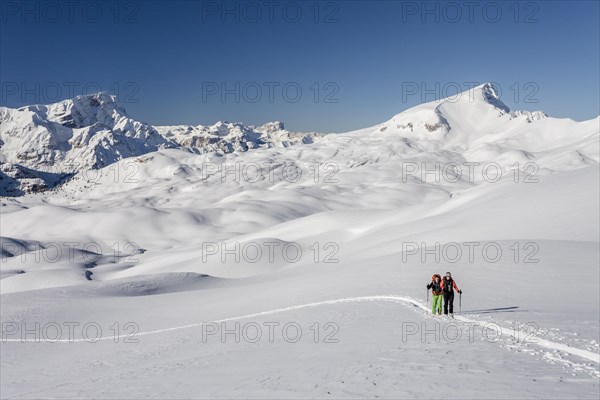 Ski mountaineers during the ascent of Mt Seekofel in the Fanes-Sennes-Prags Nature Park of the Dolomites