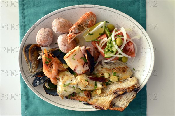 Typical fish dish with shrimps