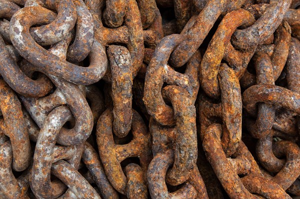 Rusted iron chain in the port