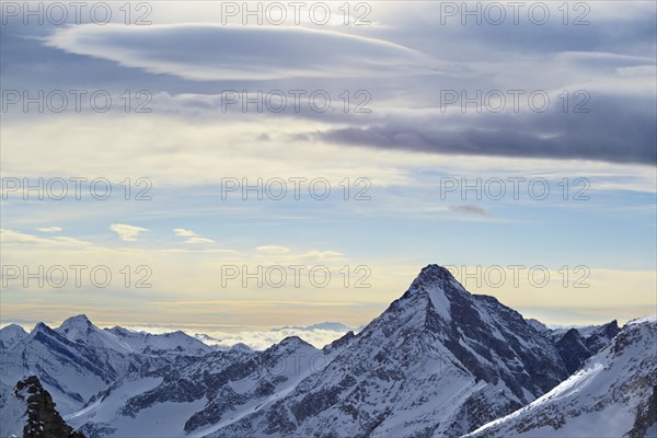 Lenticular cloud over the Zillertal Alps in winter