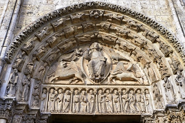 Gothic sculptures of Christ Pantocrator surrounded by the four Evangelist symbols