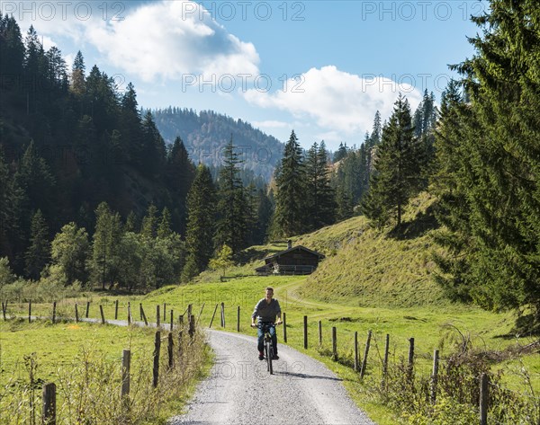 Young man riding a bicycle