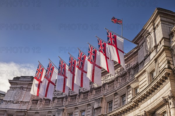 Admiralty Arch flying White Ensigns