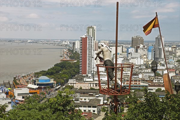 Pirate figure on Cerro Santa Ana looking on Malecon Simon Bolivar with a telescope