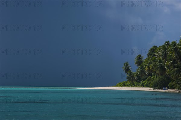 Dark rain clouds above the Ant Atoll