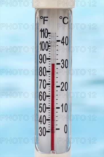 Pool thermometer showing 30 degrees Celsius