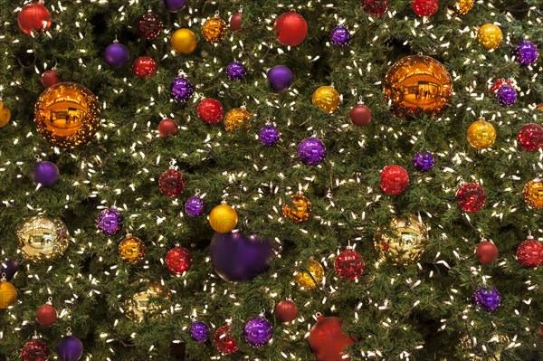 Colourful Christmas baubles and fairy lights