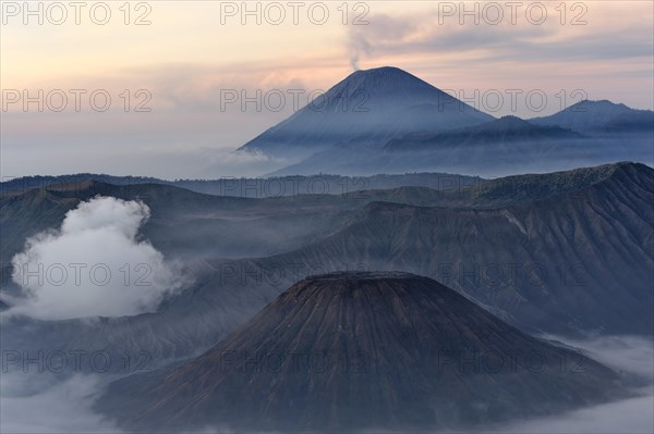 Sunrise over the smoking Gunung Bromo volcano