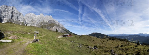 Alpine landscape with mountain mountain hut
