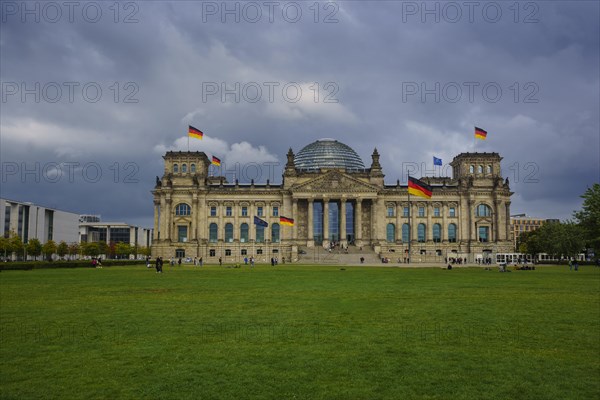 Reichstag building under a cloudy sky