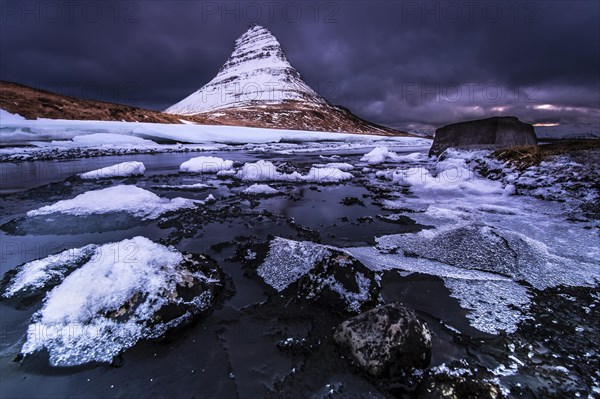 Peak of Kirkjufell with Kirkjufell river