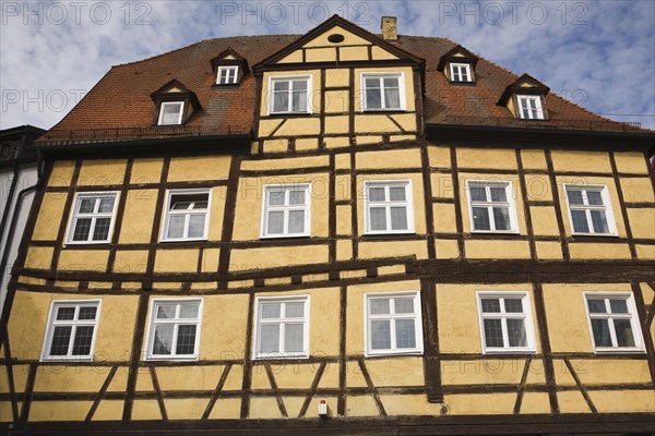 Yellow half-timbered building in the medieval town