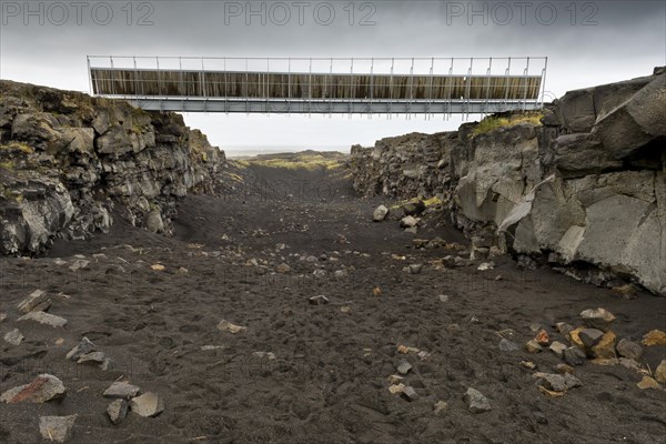 Bridge between the continents crosses the fracture zone between the American and European tectonic plates