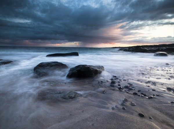 Rain clouds by the coast