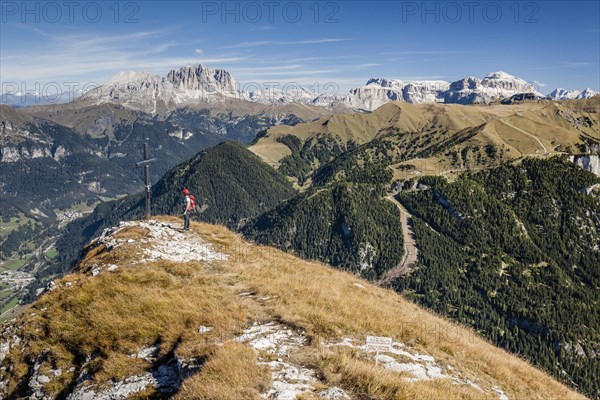 Climber on the summit of Cima Dodici