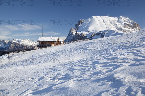 Mountain pasture in front of Plattkofel in winter