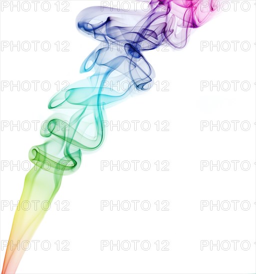 Colourful smoke from an incense stick or joss stick