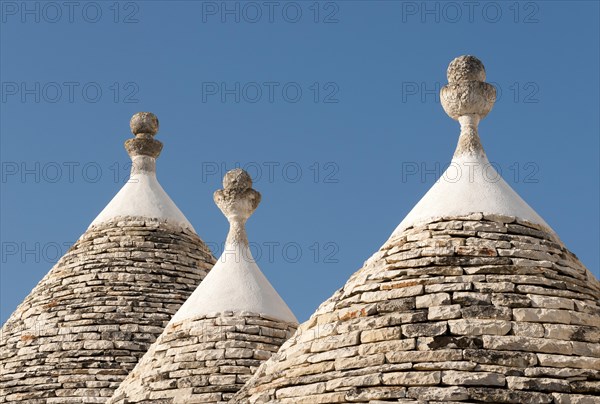 Conical roofs and pinnacles of Trullo houses