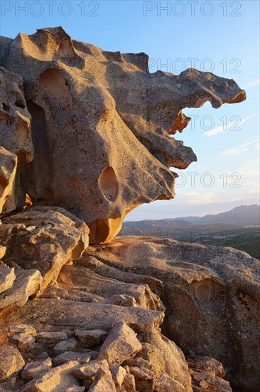 Rock formations at Capo d'Orso or Cape Bear in the evening light