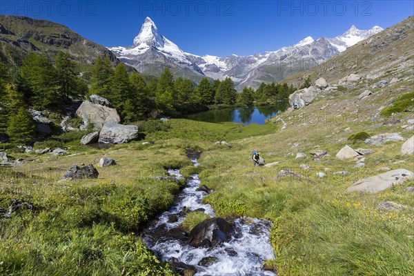 Man hiking at Grindjisee lake