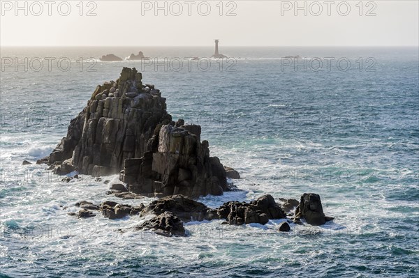 Armed Knight rocks and Wolf Rock Lighthouse behind