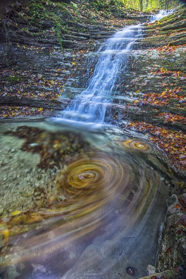 Waterfall in the forest in autumn