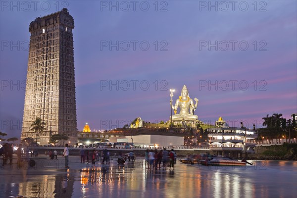 Giant statue of Lord Shiva and a Gopura tower