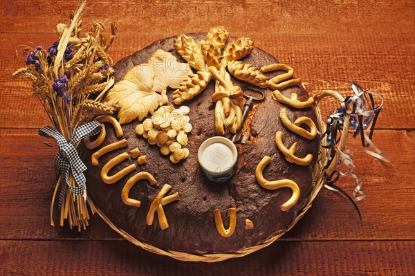 Decorated bread loaf with a salt shaker