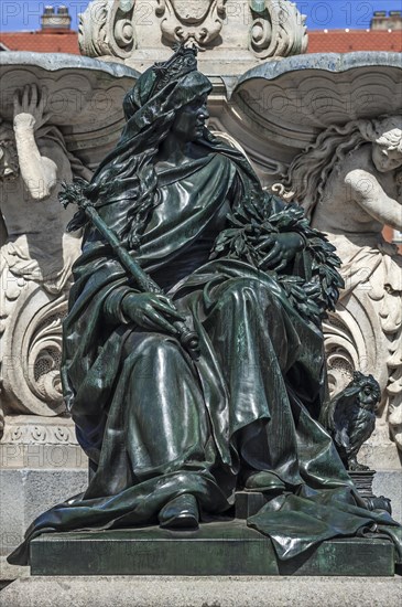 Sculpture of Alma Mater with the symbols of science at the Pauli Fountain from 1889