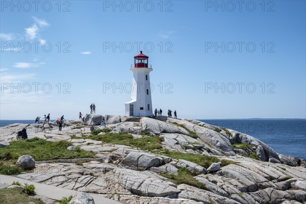 Lighthouse on granite rocks in Peggys Cove