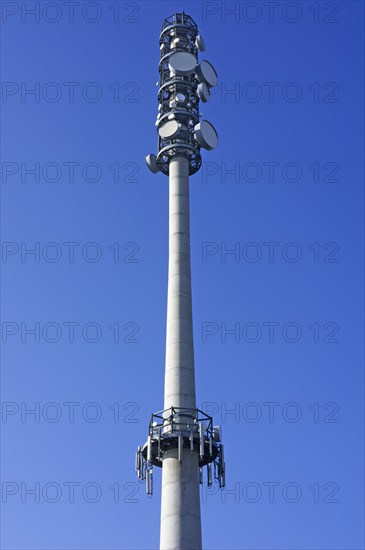 Transmission tower against a blue sky