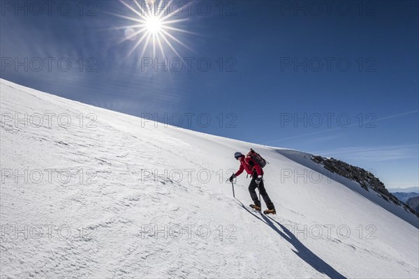 Mountaineer at Mt Gliederferner during the ascent of Mt Hoher Weisszint