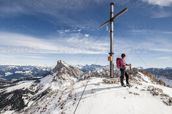 Mountaineer on the summit of Mt Tullen