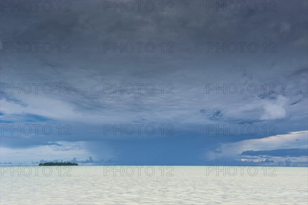 Dramatic sky above an islet