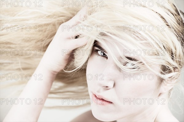 Young woman with long blond hair