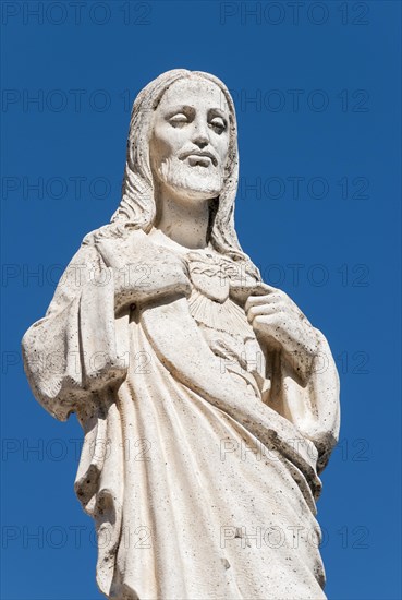 White Statue of Jesus Christ outside the Chapel of Virgen de la Pena