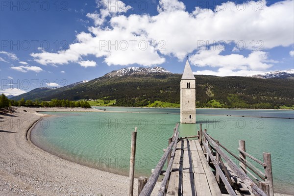 Steeple of Alt-Graun in Lake Reschensee in Alta Val Venosta