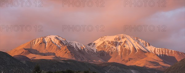 The Taapaca volcano at sunset