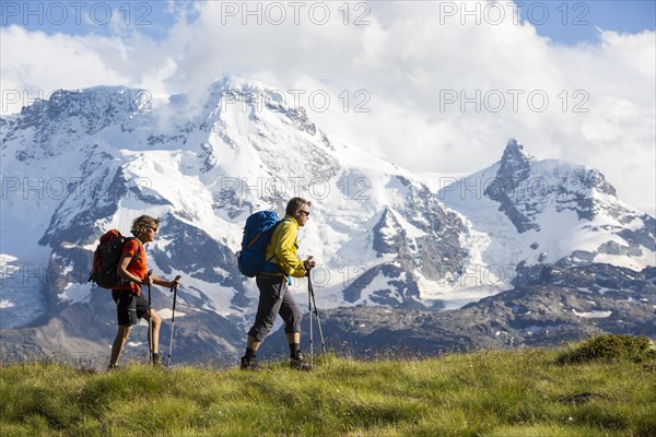 A man and a woman hiking