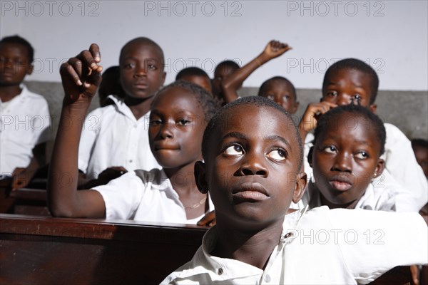 School children in school uniform during class